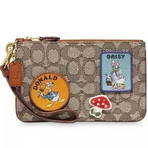Coach Bags Donald And Daisy Duck Wristlet By Coach Poshmark
